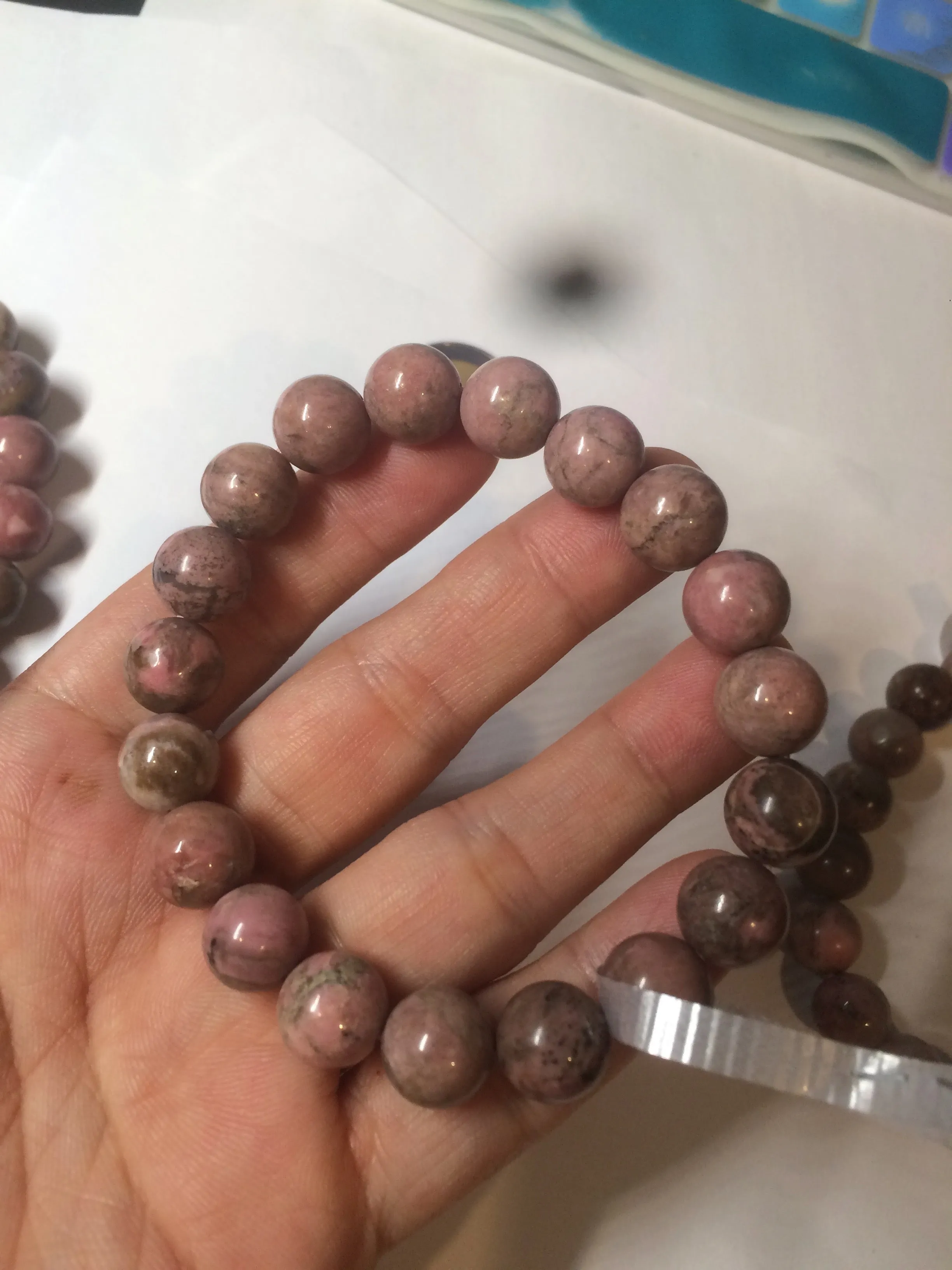 10-10.3mm 100% natural pink/black rose stone (Rhodonite) bracelet SY41