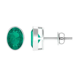 1.75 CT Bezel Set Oval Cut Emerald Solitaire Stud Earrings