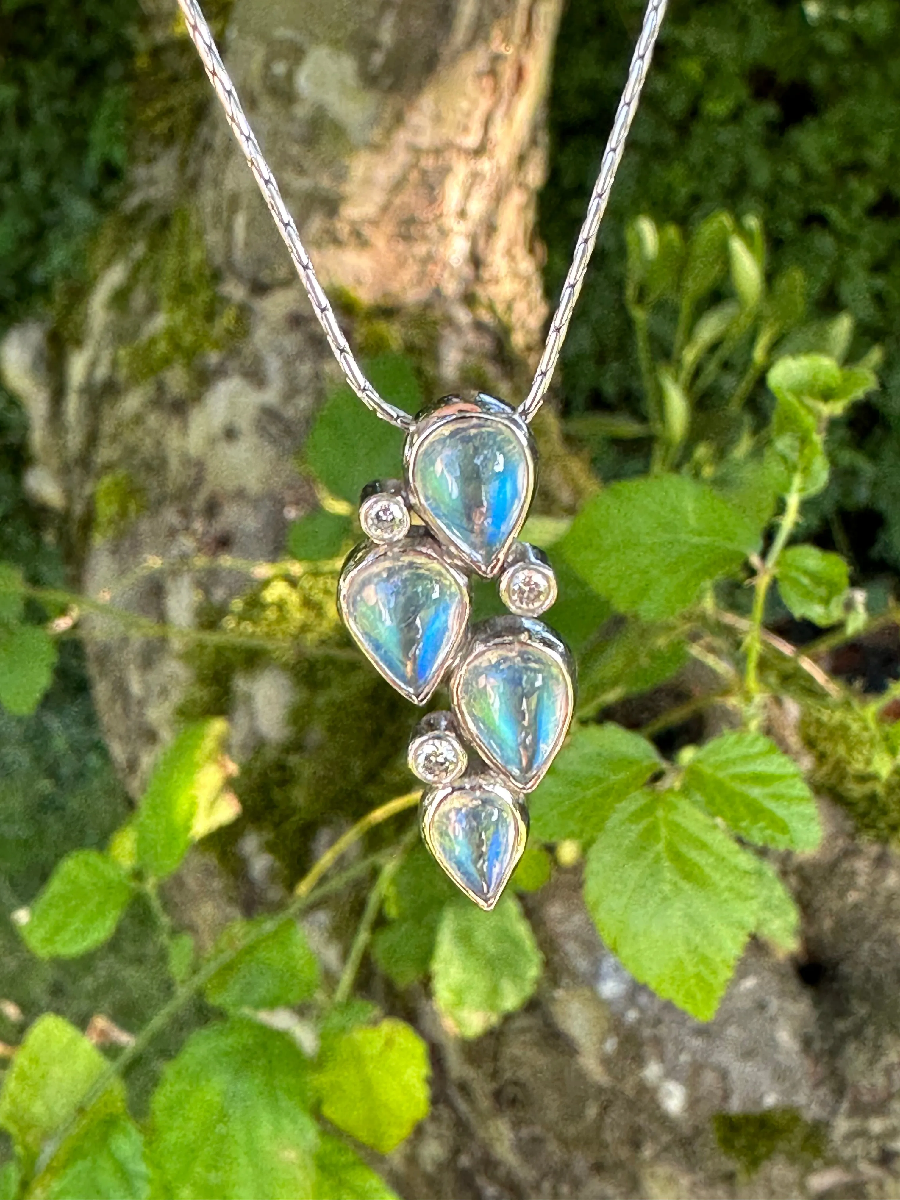 18ct white gold moonstone and diamond pendant