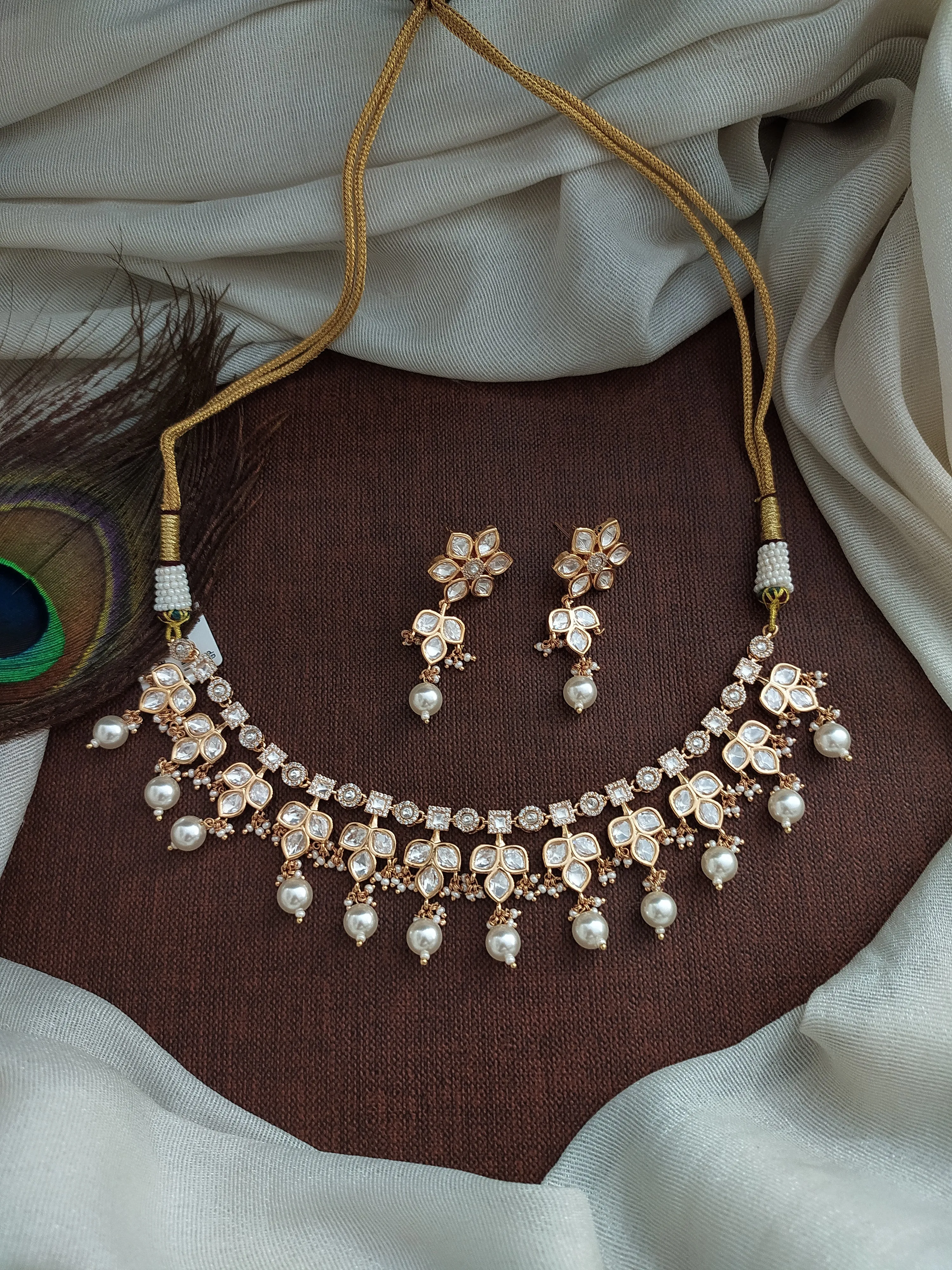 Kundan Choker/Necklace Set with Floral Design, Uncut Diamond Stones, and Jhumki Earrings