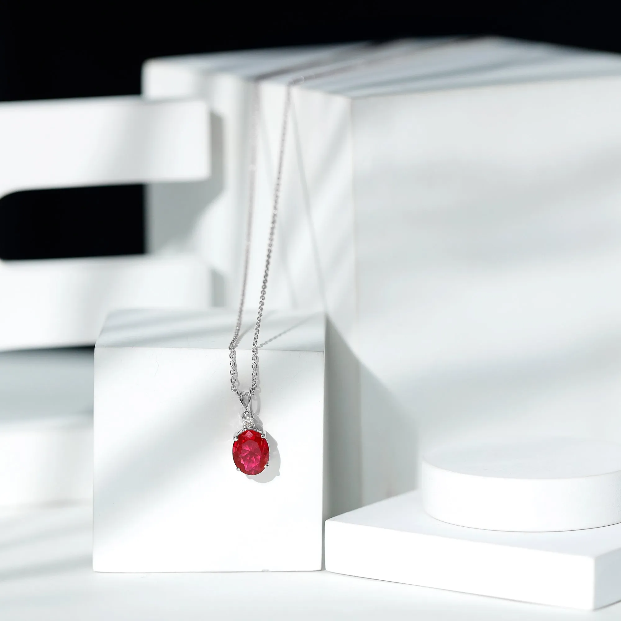 Solitaire Created Ruby Oval Pendant with Moissanite