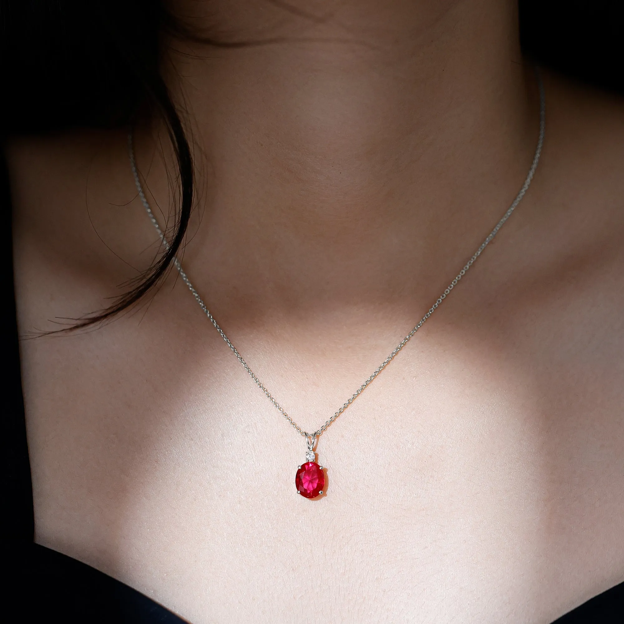 Solitaire Created Ruby Oval Pendant with Moissanite