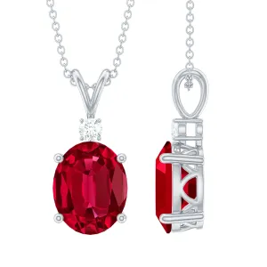 Solitaire Created Ruby Oval Pendant with Moissanite