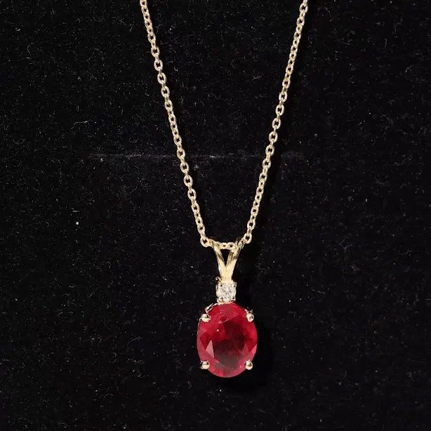 Solitaire Created Ruby Oval Pendant with Moissanite