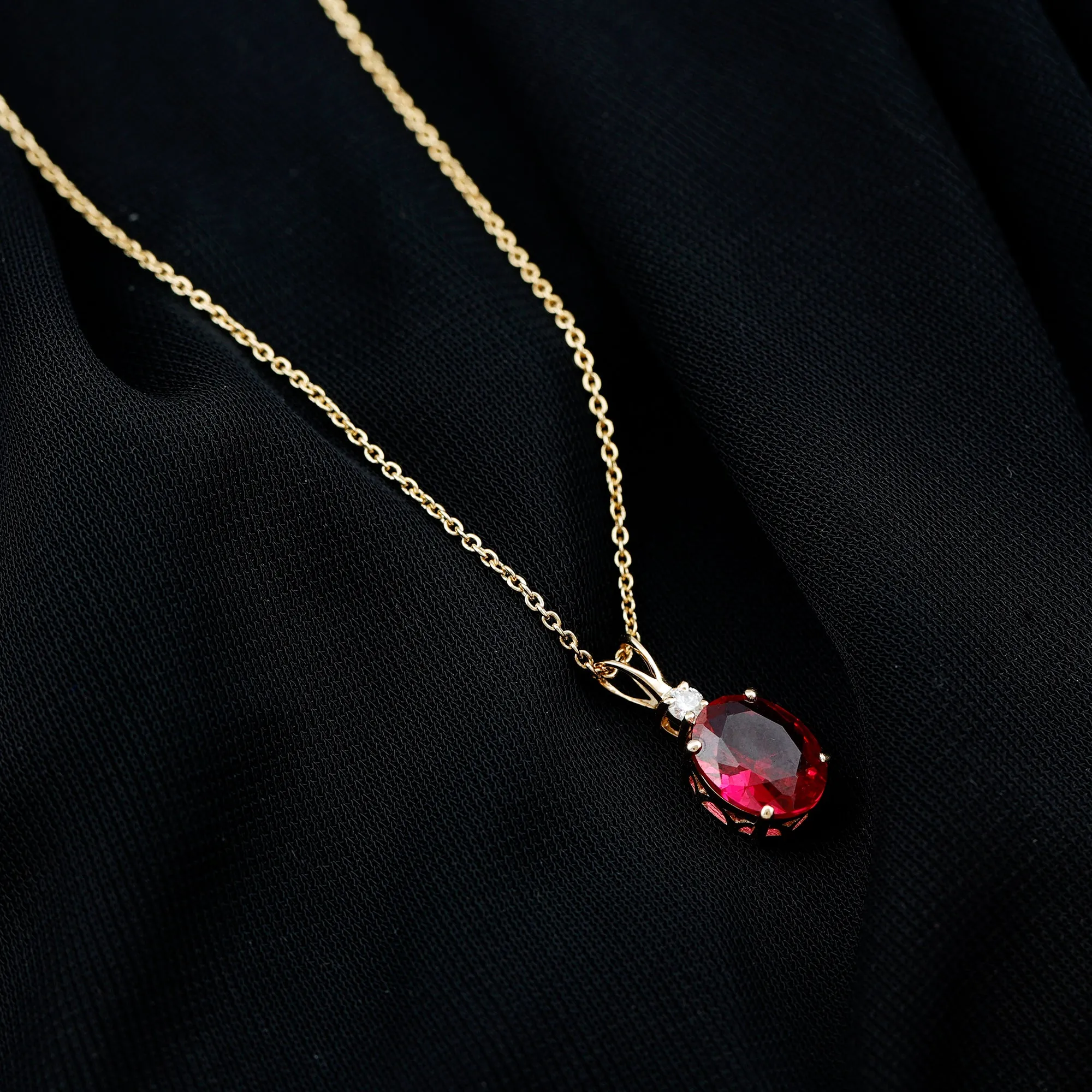 Solitaire Created Ruby Oval Pendant with Moissanite