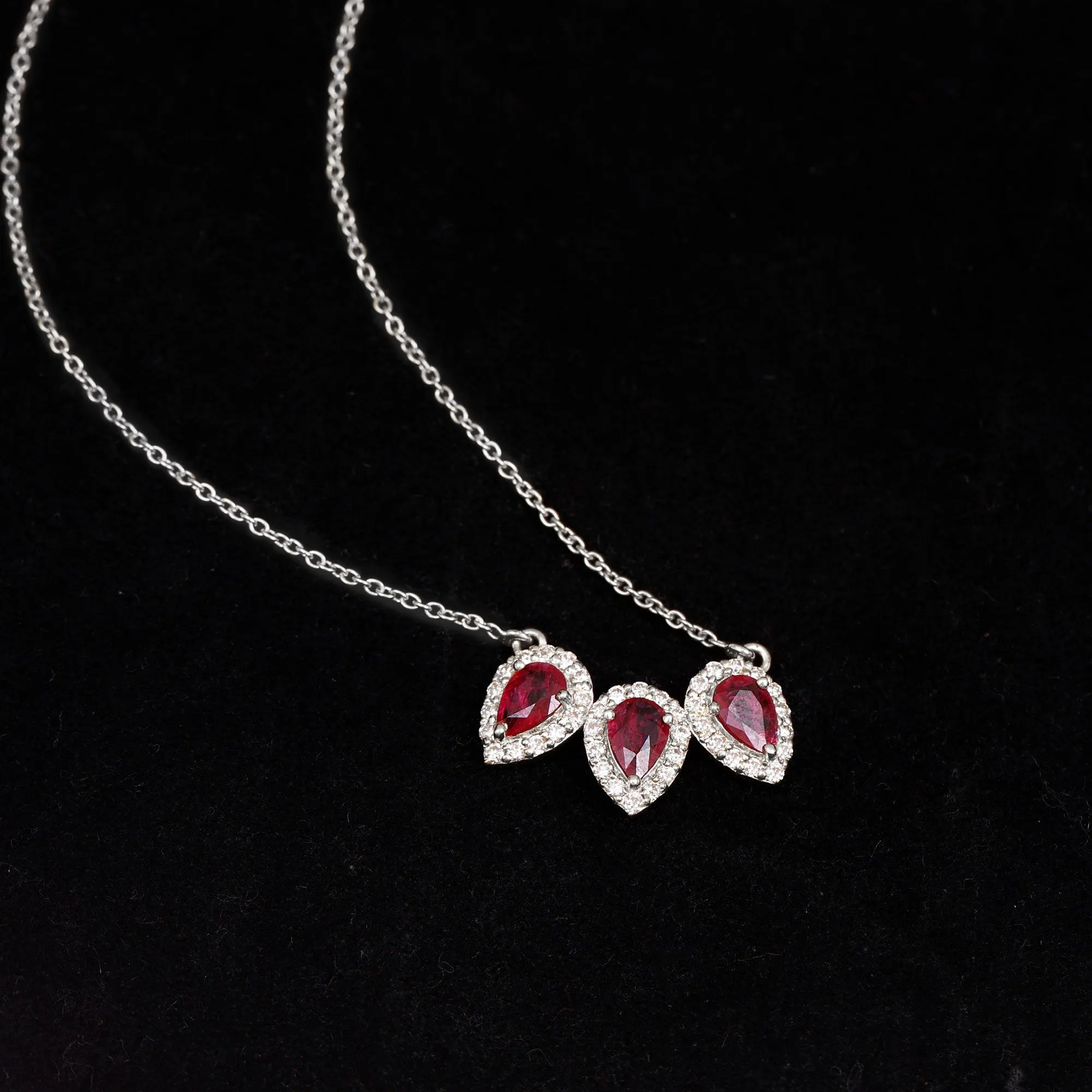 Three Pear Cut Created Ruby and Moissanite Halo Leaf Necklace
