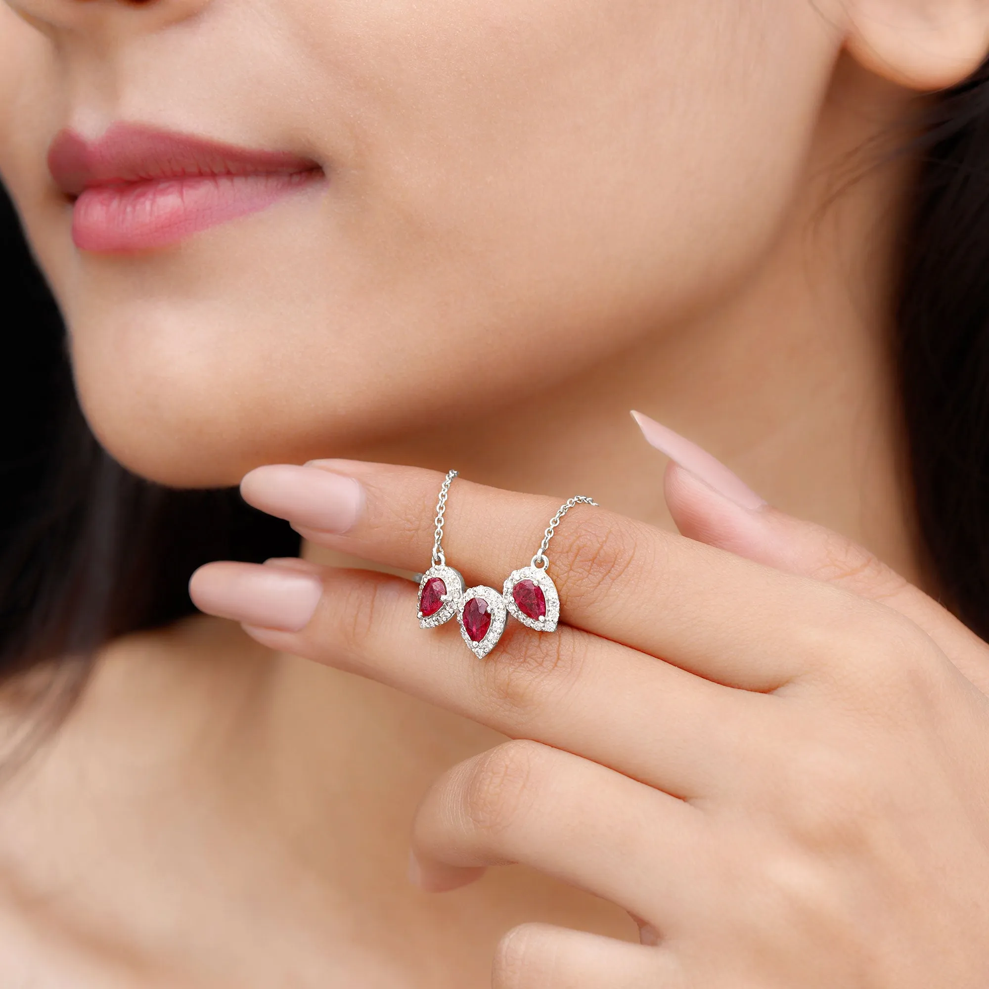 Three Pear Cut Created Ruby and Moissanite Halo Leaf Necklace