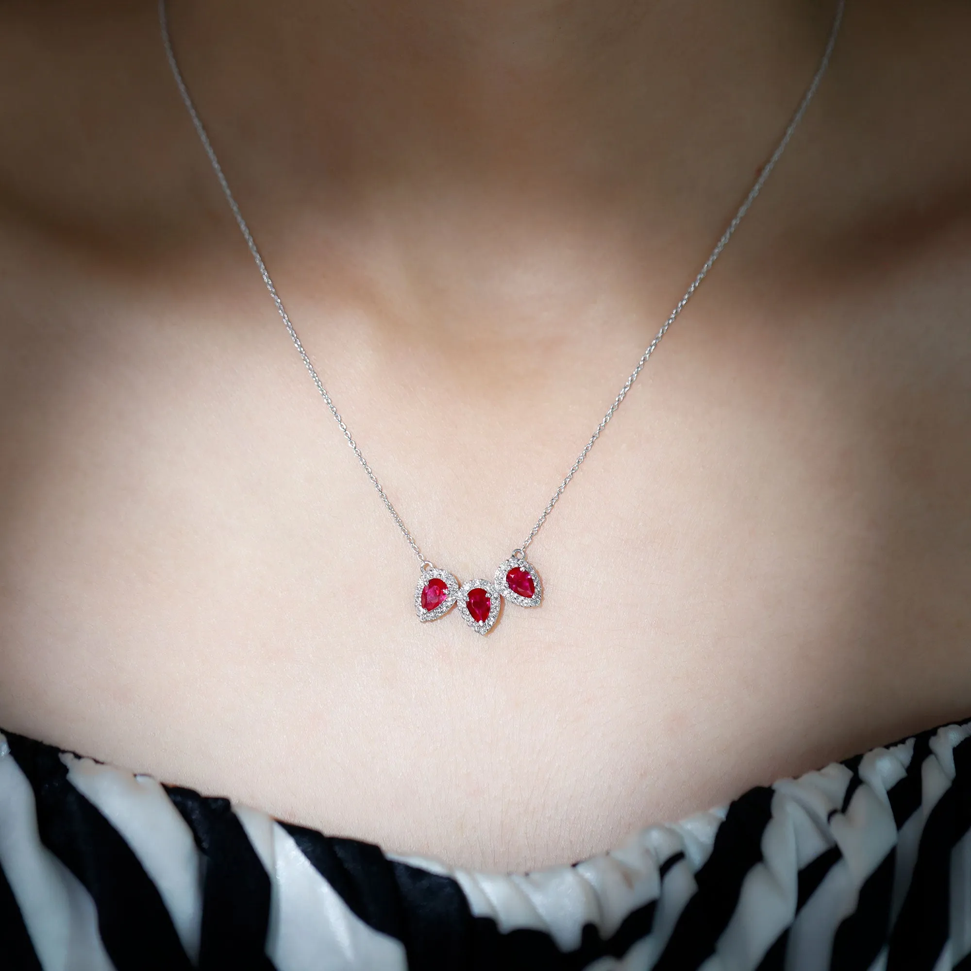 Three Pear Cut Created Ruby and Moissanite Halo Leaf Necklace
