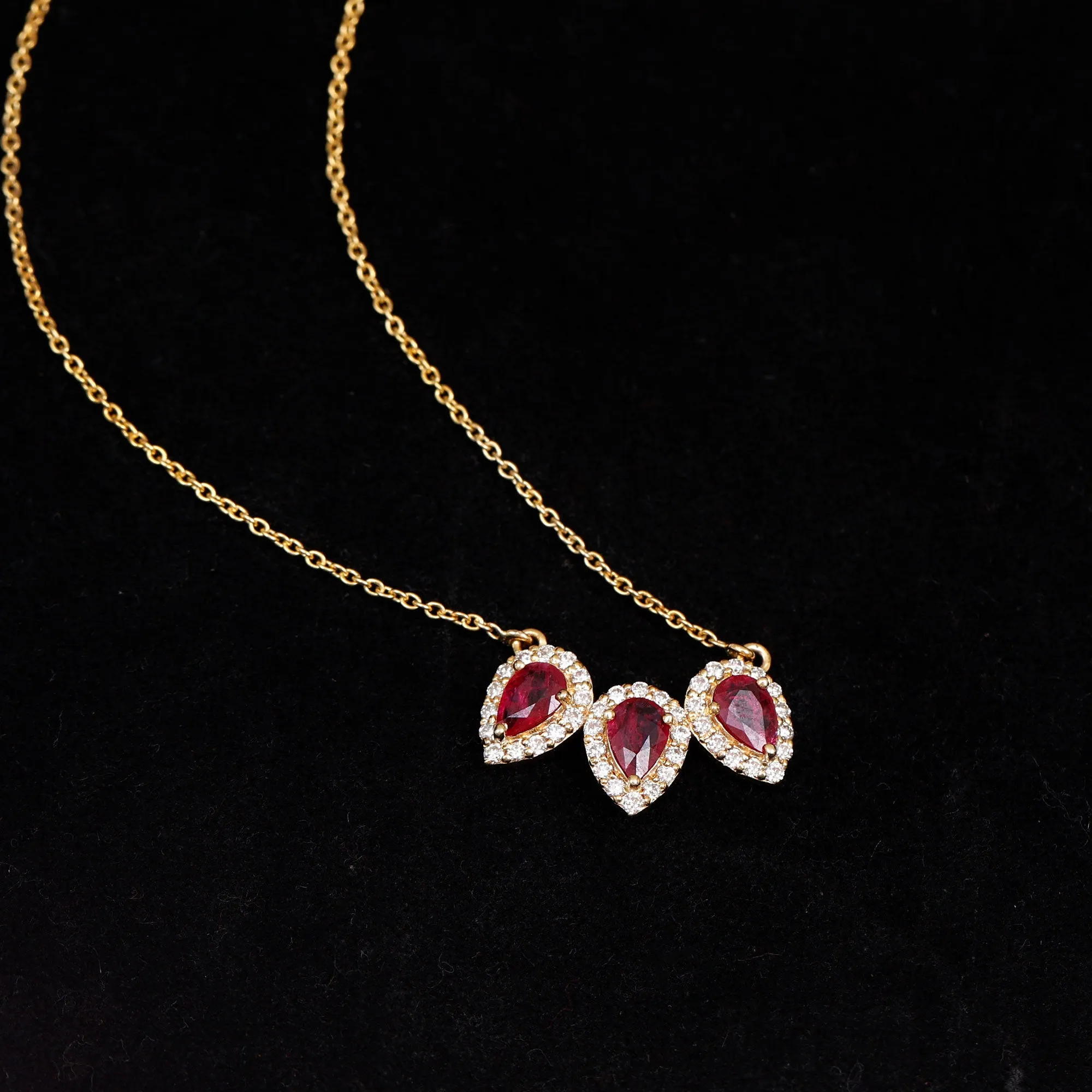 Three Pear Cut Created Ruby and Moissanite Halo Leaf Necklace